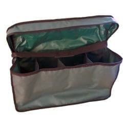 An open, empty care home bag with four inner compartments